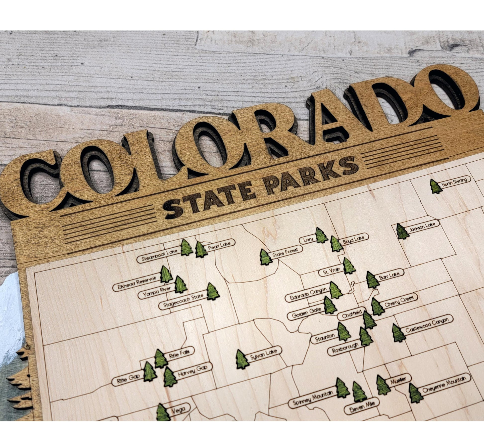 Detailed engraved [State Name] State Park map, laser cut wood wall art for outdoor lovers and campers