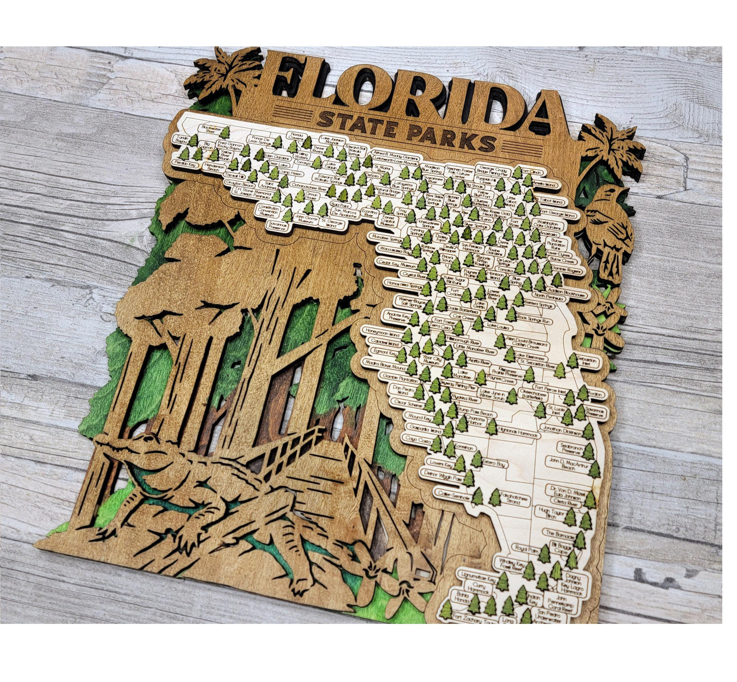 Wooden Florida State Park map hanging on wall, rustic engraved travel and adventure decor
