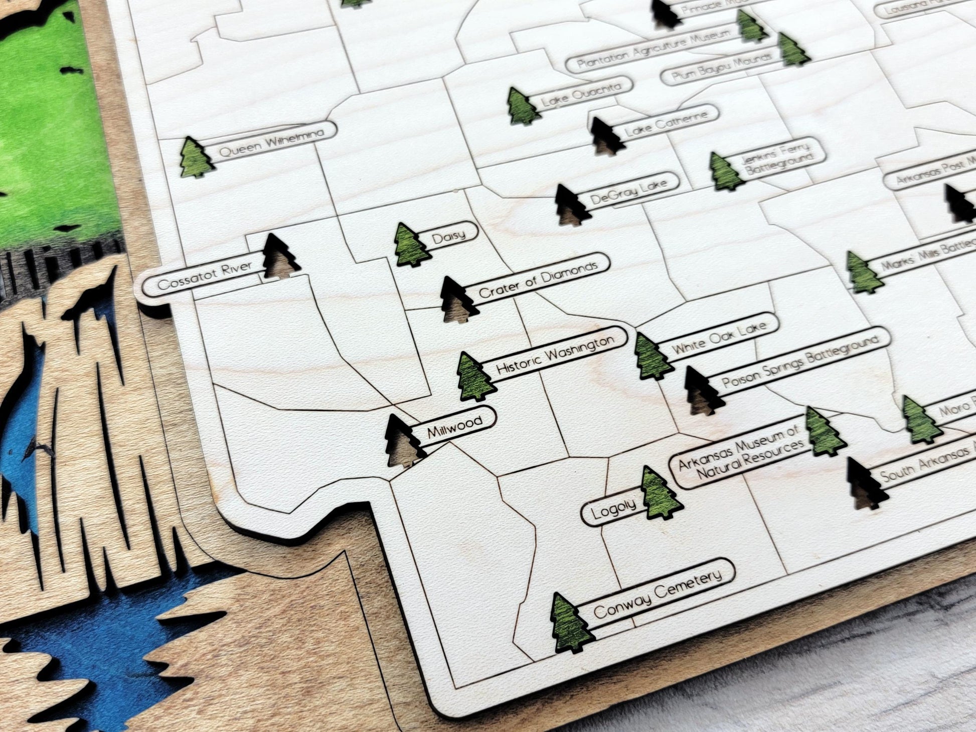 Custom engraved wood travel map featuring Arkansas state parks, rustic wall decor for travelers.